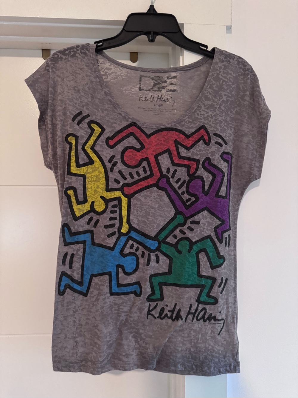 Keith Haring Women's Gray Short Sleeve Graphic Tee with Multicolor Figures